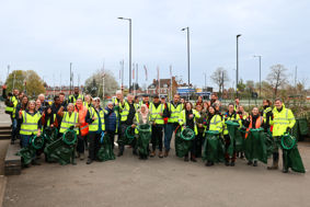 Volunteers for the litter pick gather in a group
