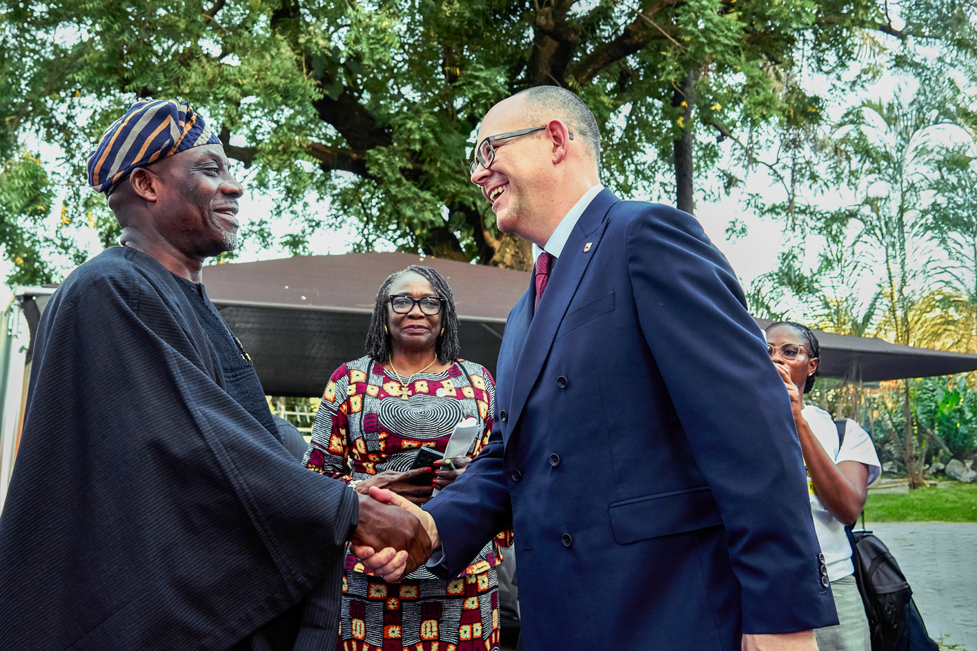 Nigerian Minister of Education Dr Maruf Tunji Alausa shakes hands with Professor Nick Vaughan-Williams