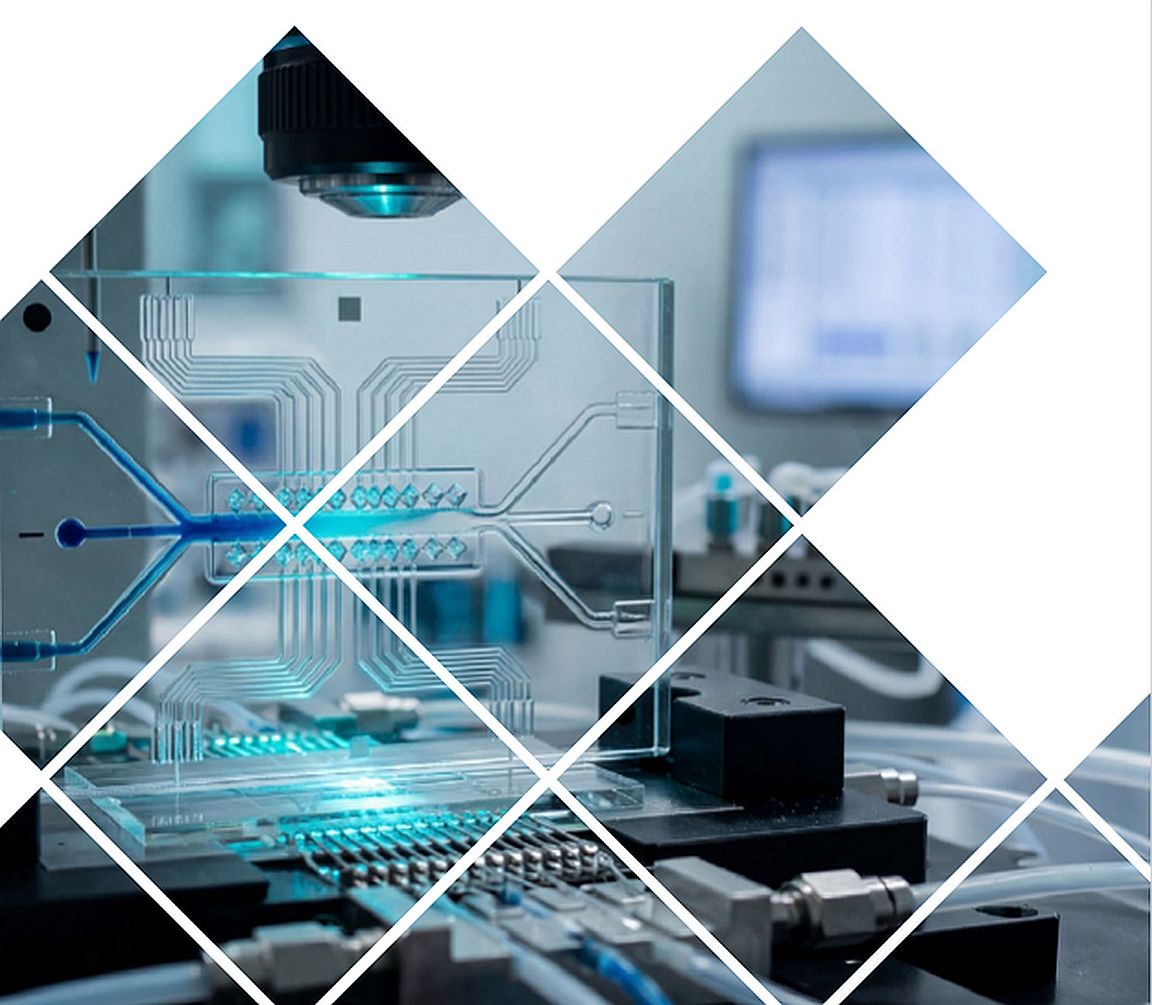 A glass panel with a circuit board etched into it, sits upon a piece of electronic equipment