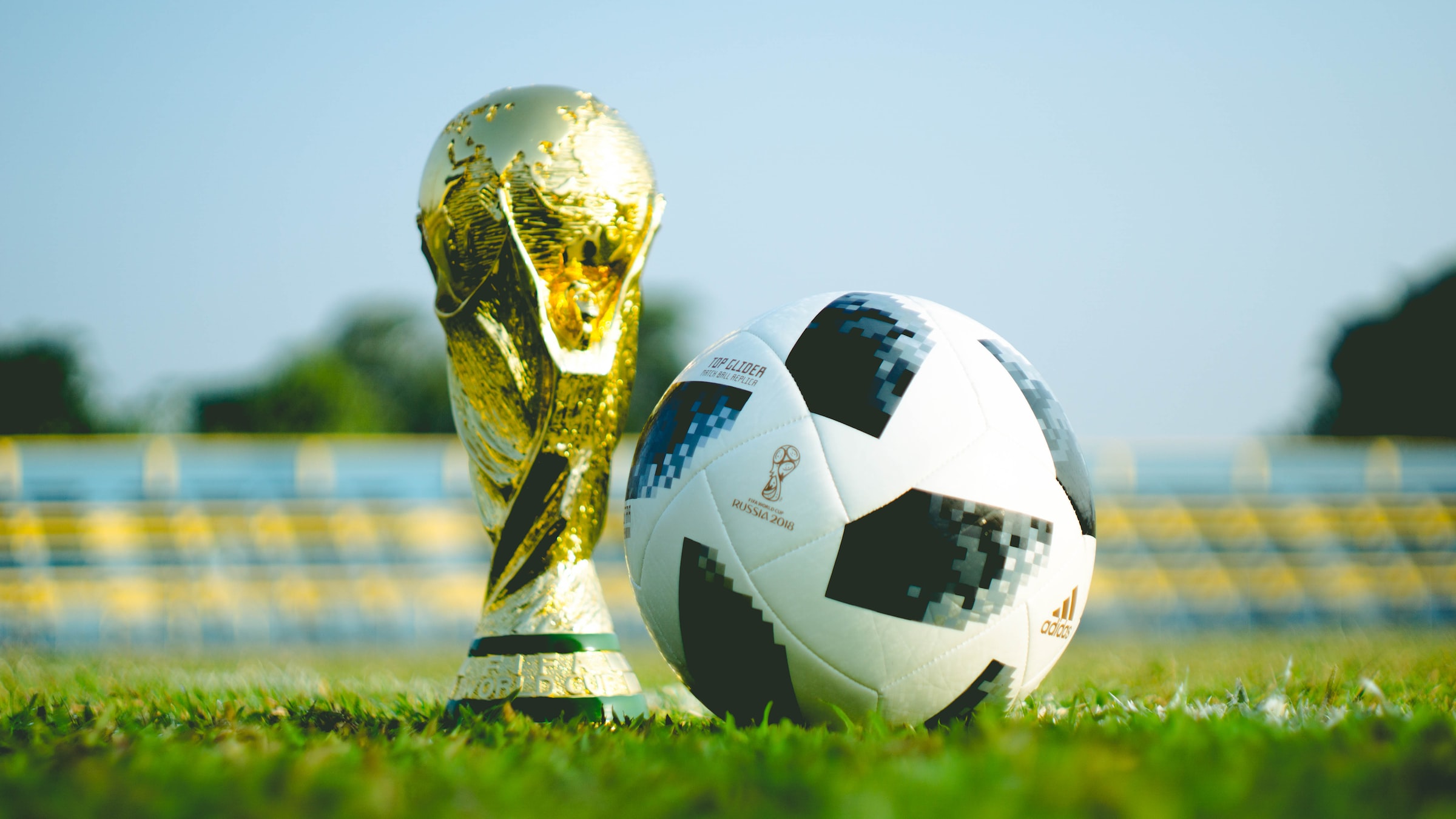 World Cup trophy and football