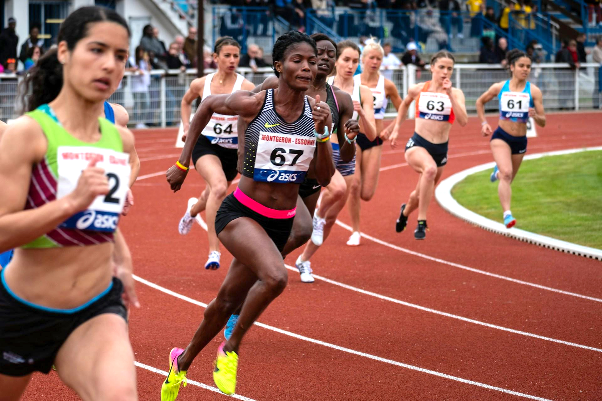 Female athletes running in a track race