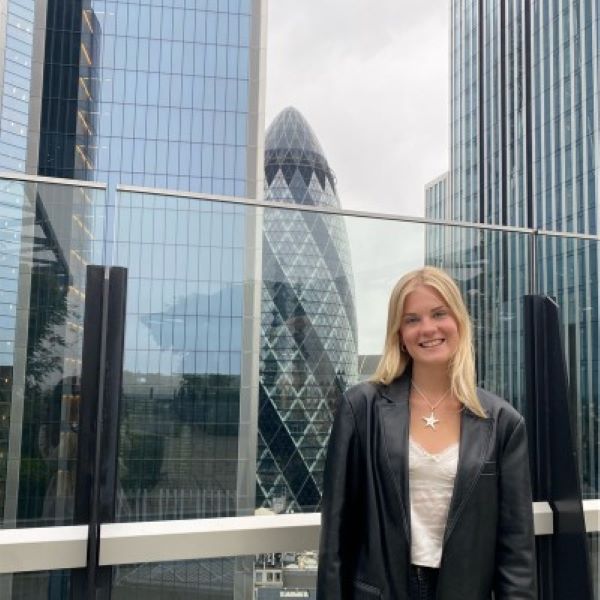 Frances Astill, Pharmacy student standing with London skyline