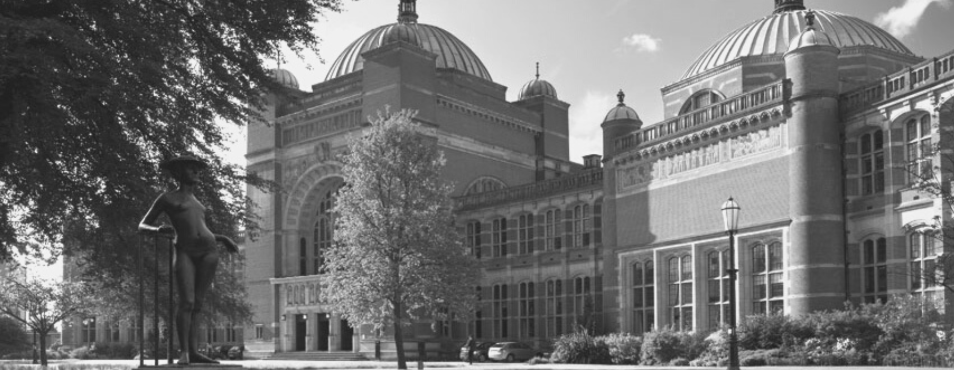 Aston Webb building - large domes buildings to the rear and trees to the foreground