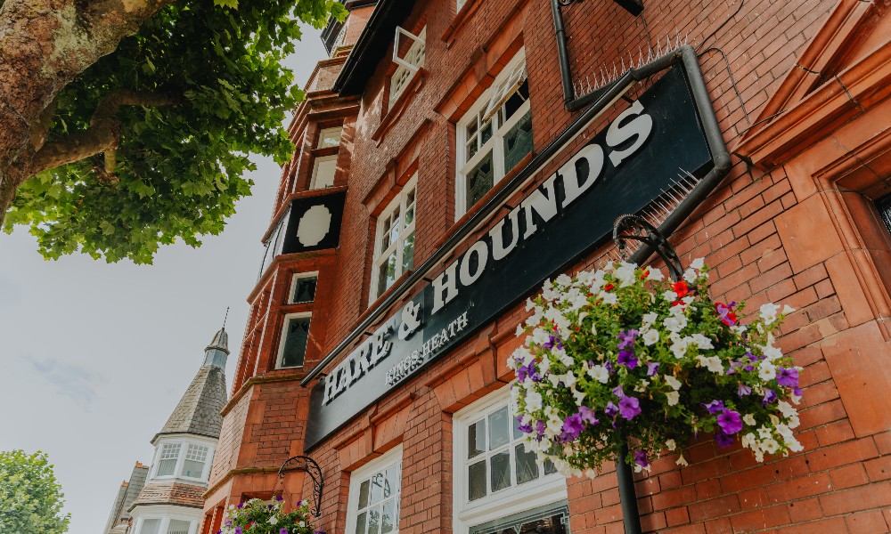 Outside of a pub with hanging baskets
