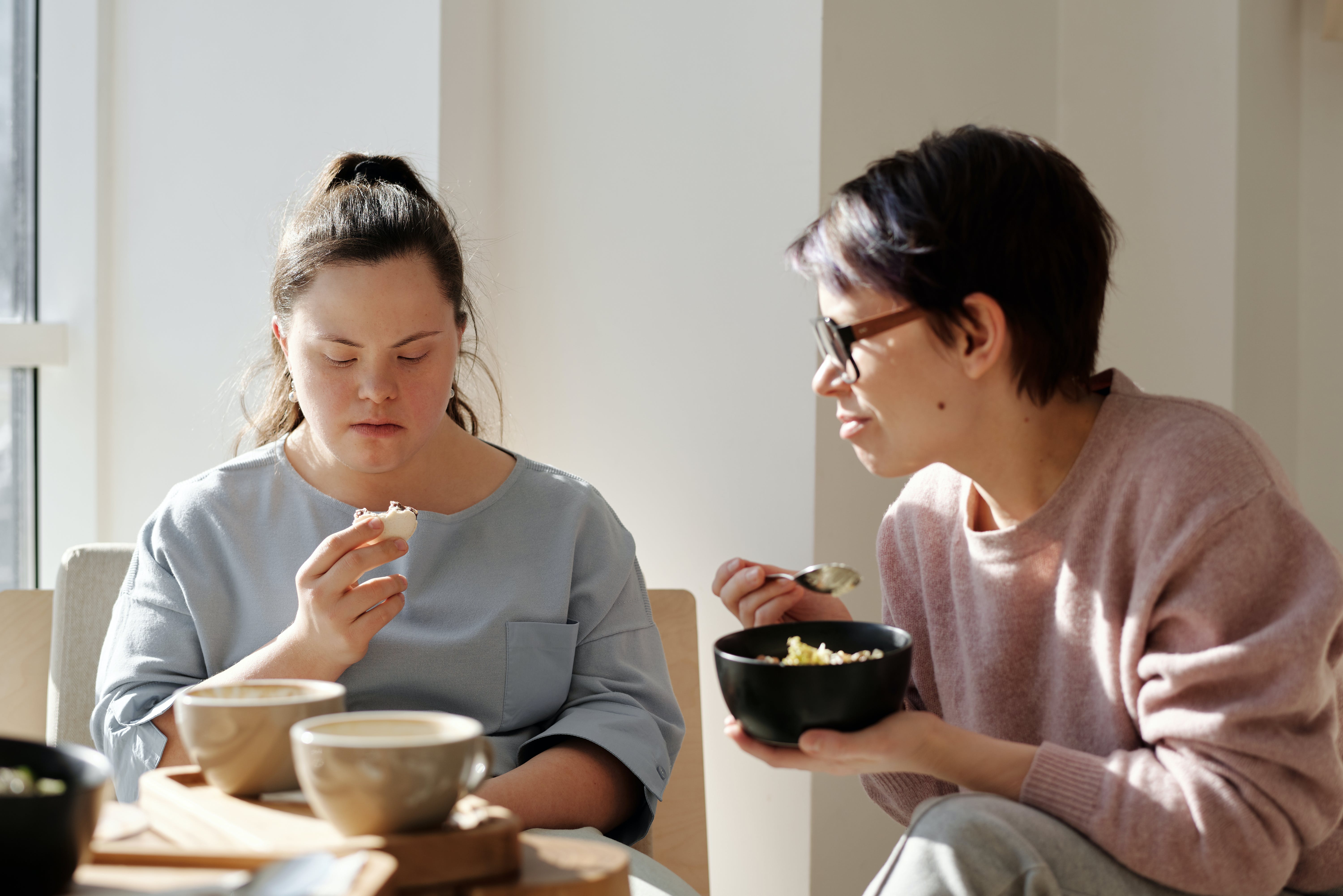 Two people eating food