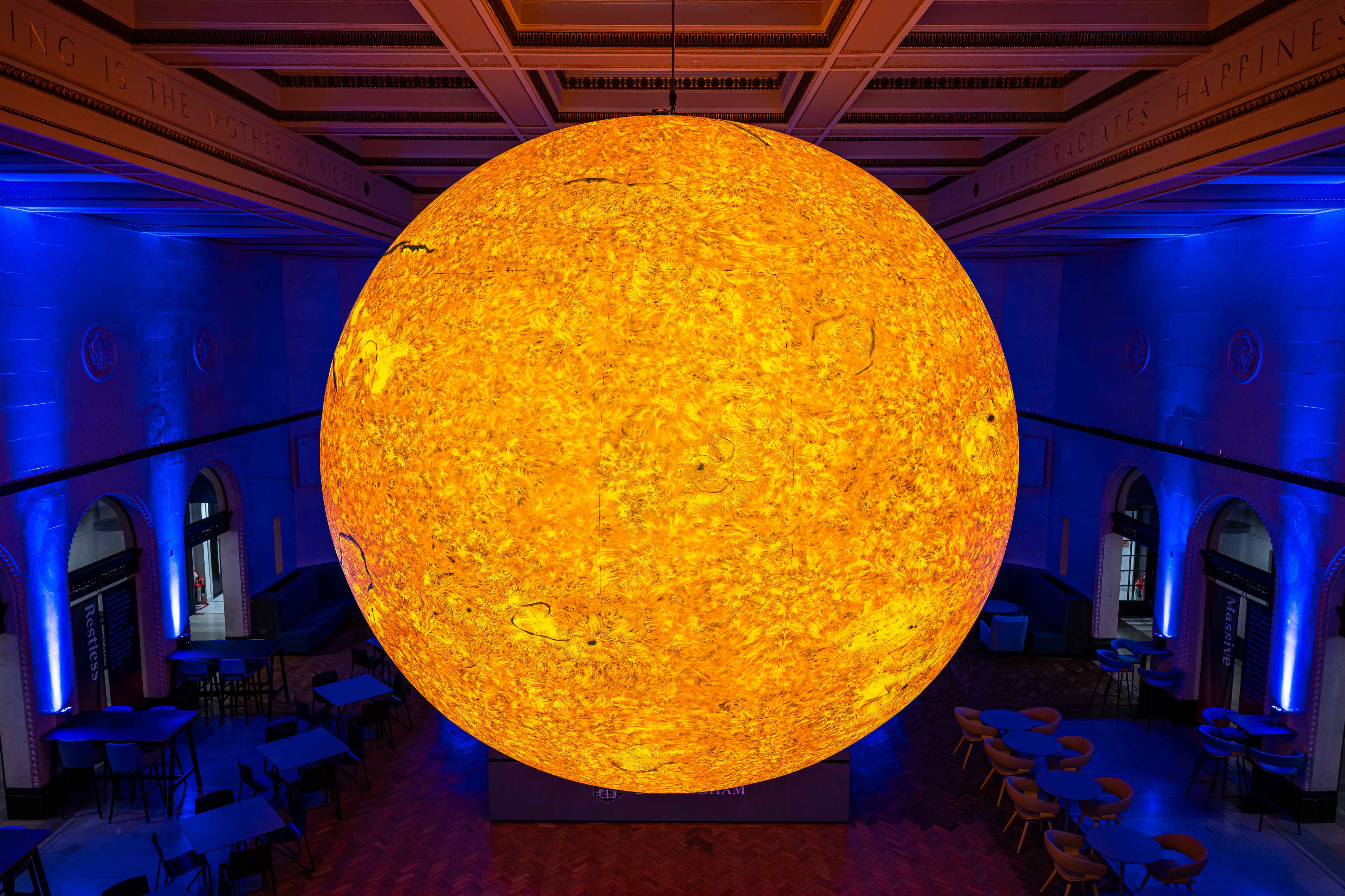 Helios, a large illuminated sculpture of the sun in The Exchange.