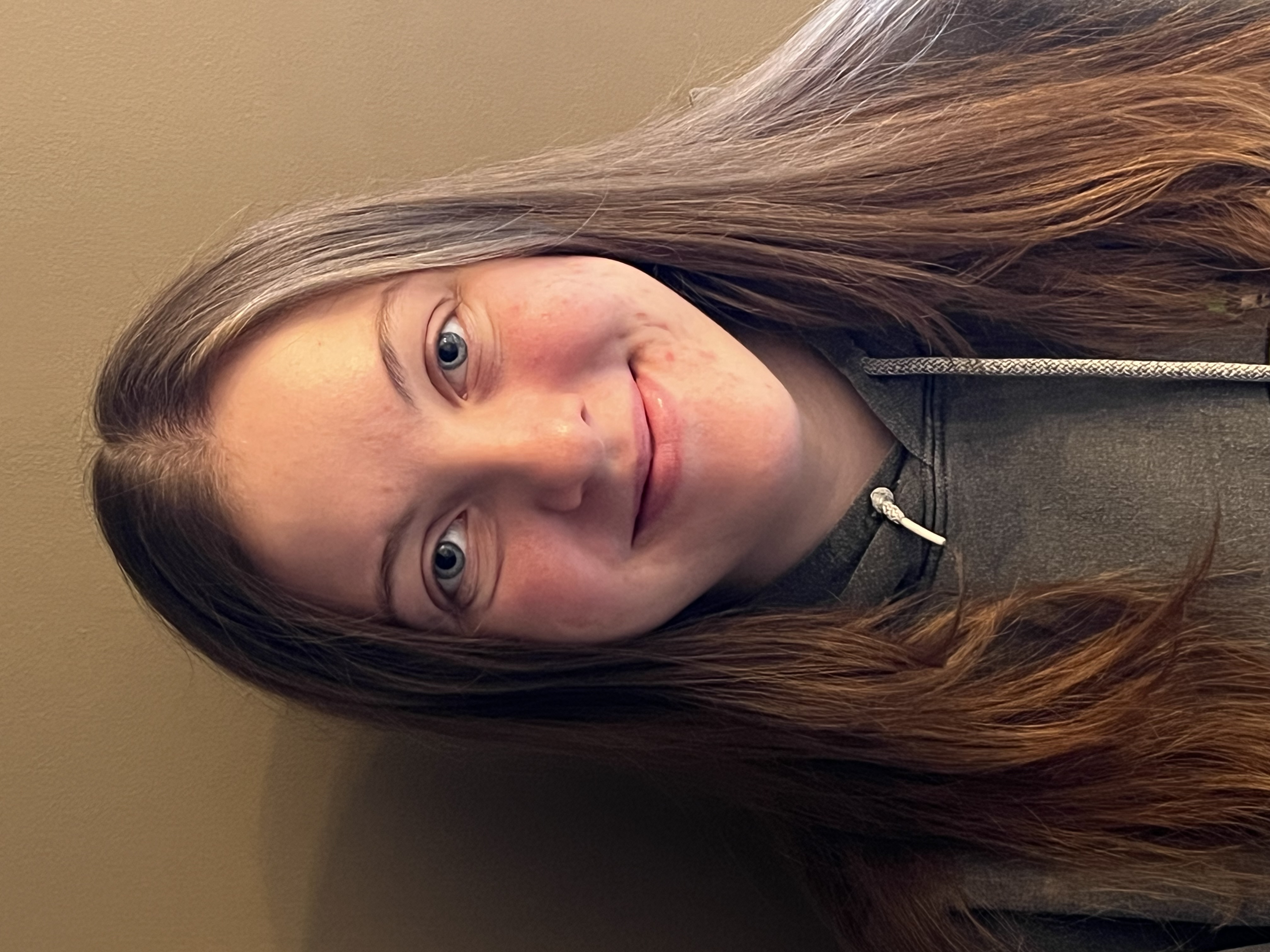 Portait style photo of woman smiling