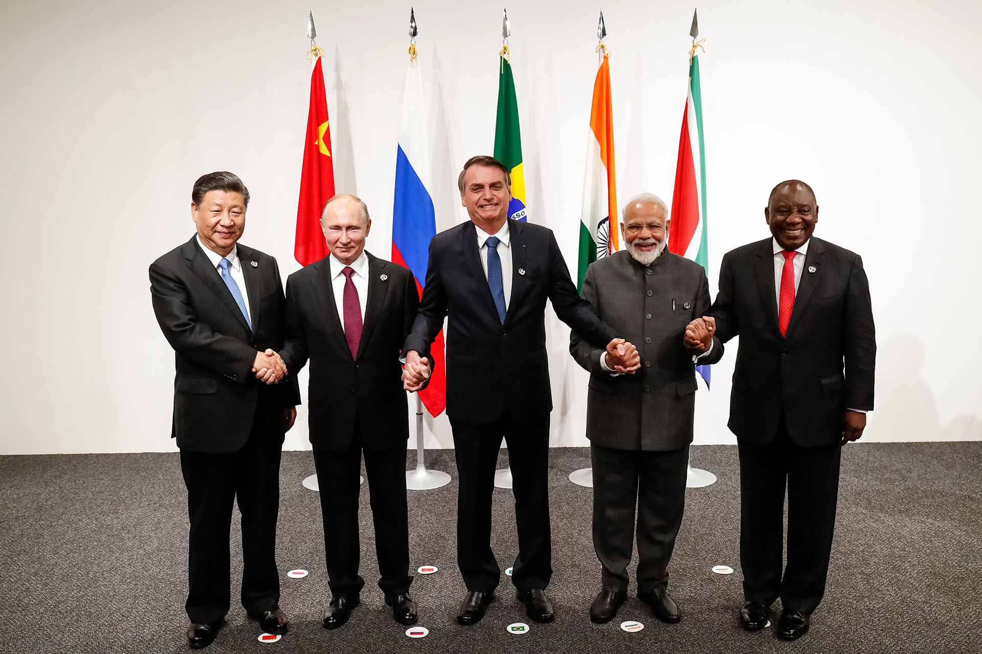 leaders of BRICS at the 2019 G20 Osaka summit standing together in an informal  group
