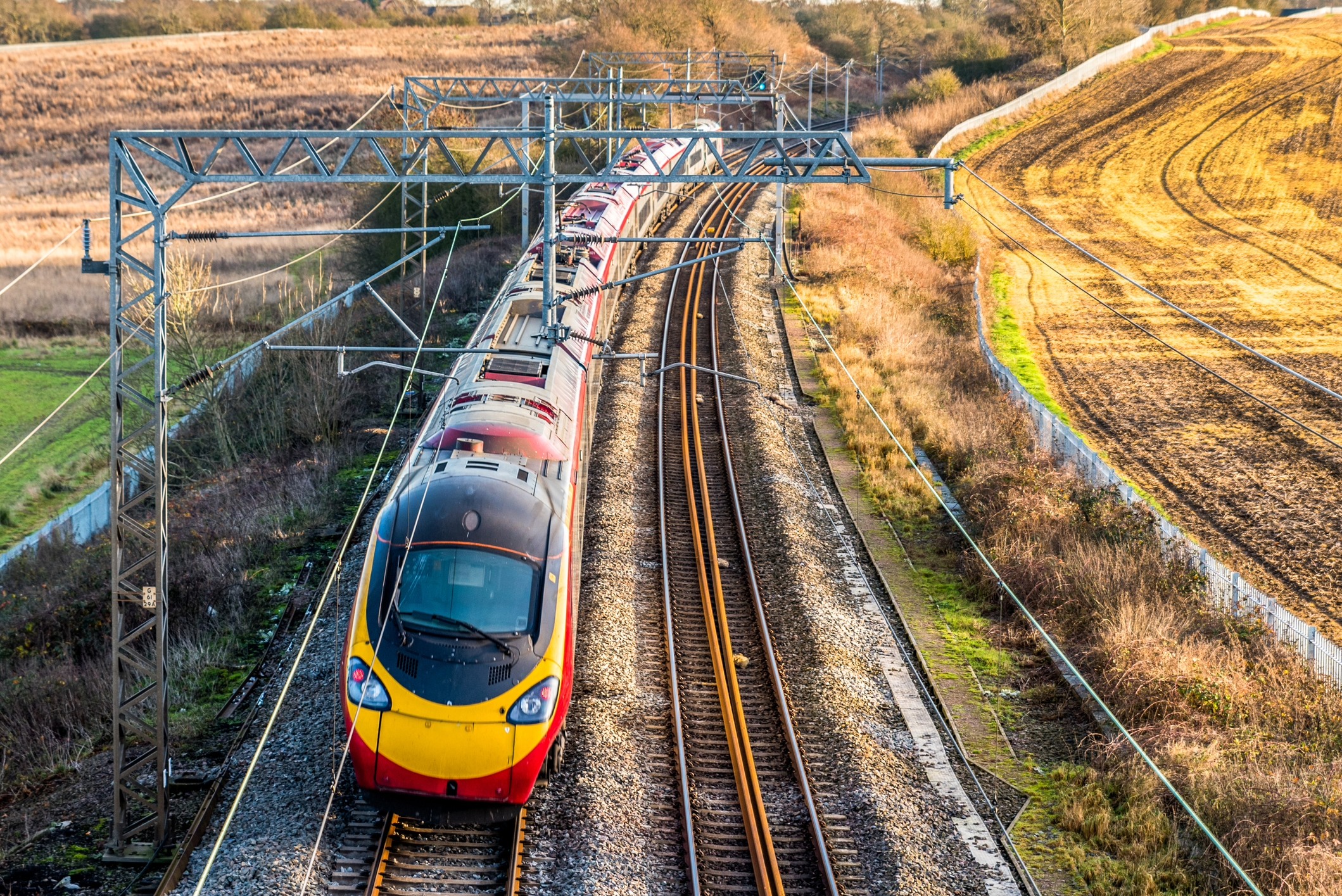 A train driving through the countryside.