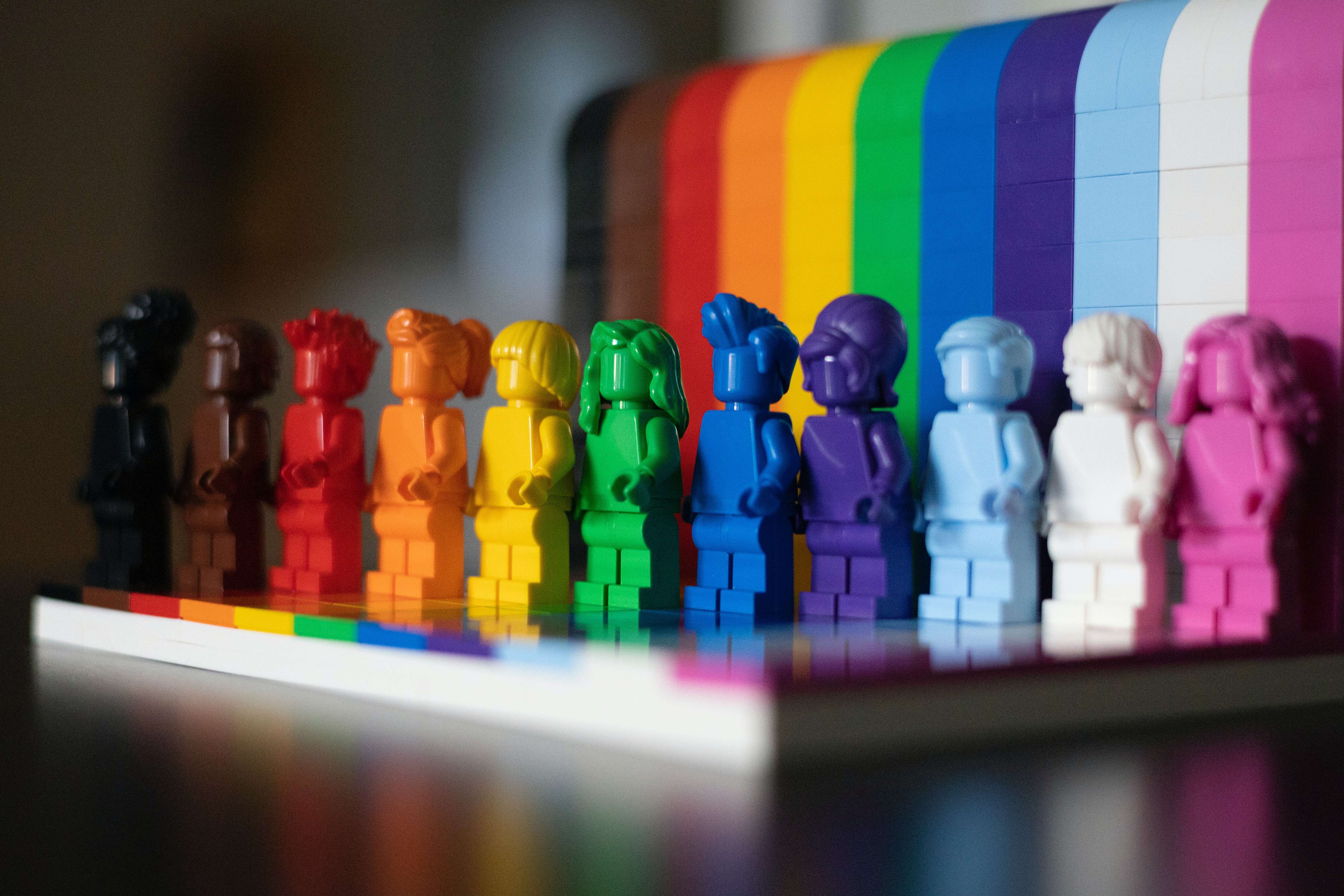 Rainbow coloured toy figures