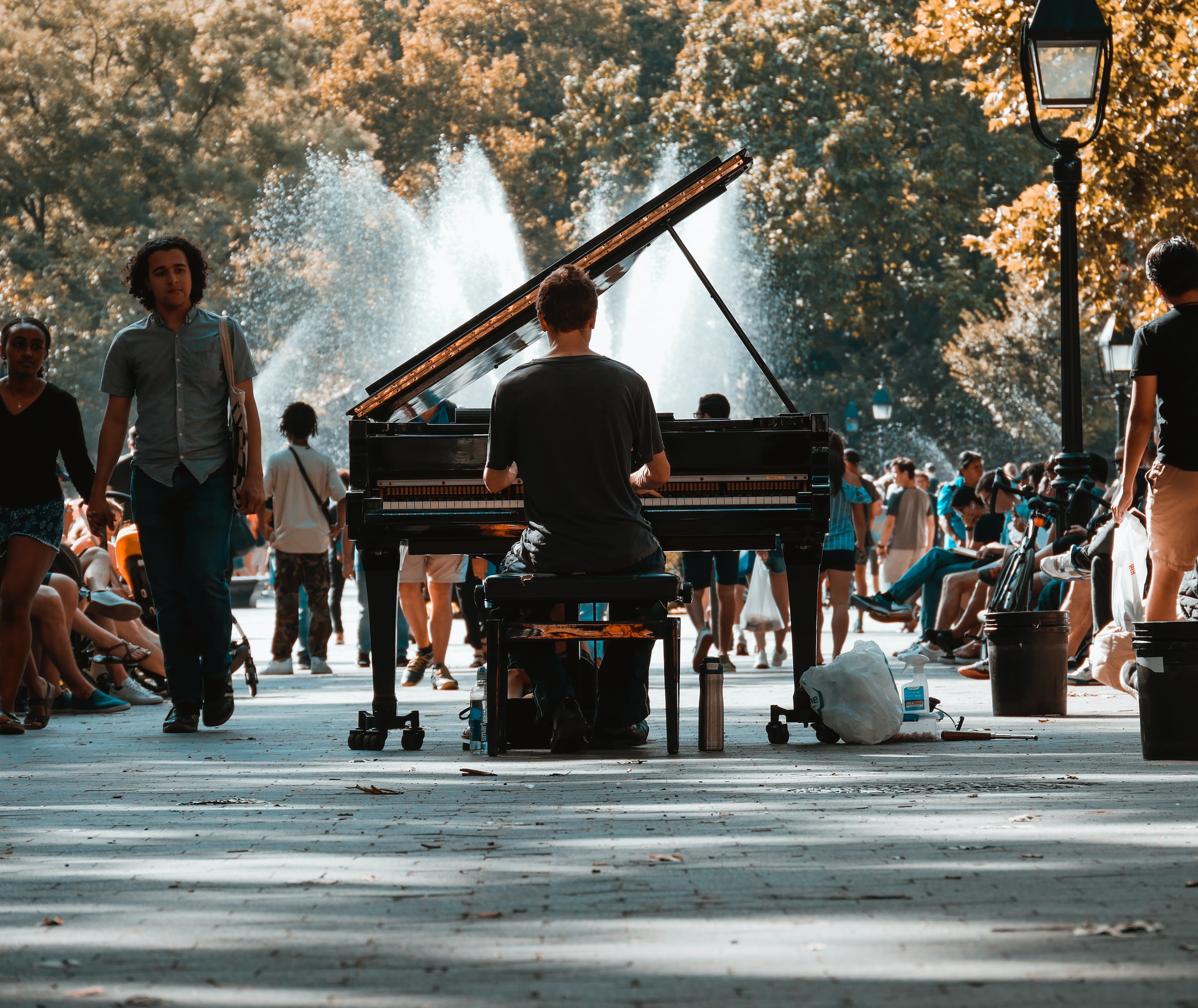 Man playing piano in street