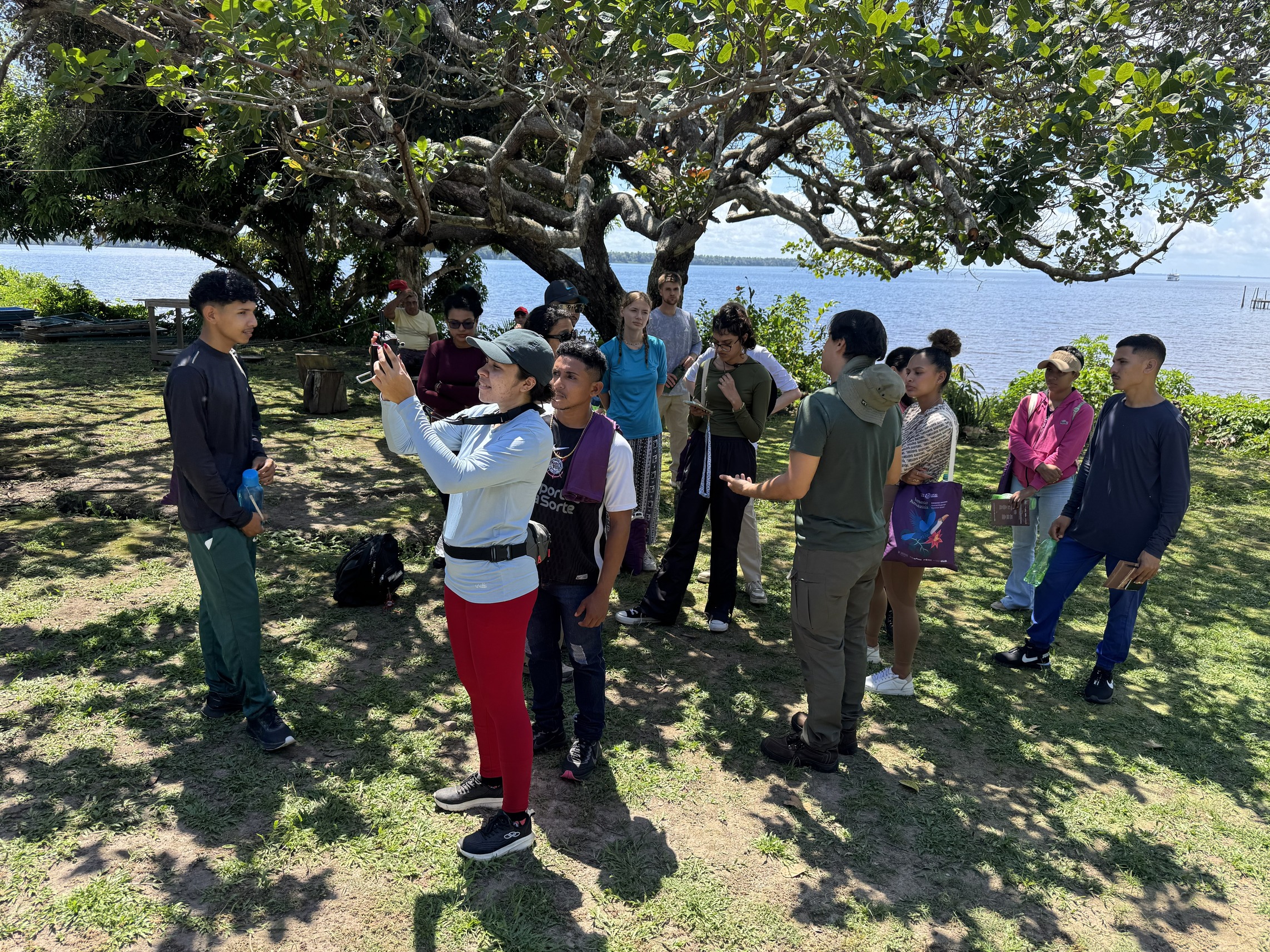 Immerse Amazonia Students controlling LiDAR drone 