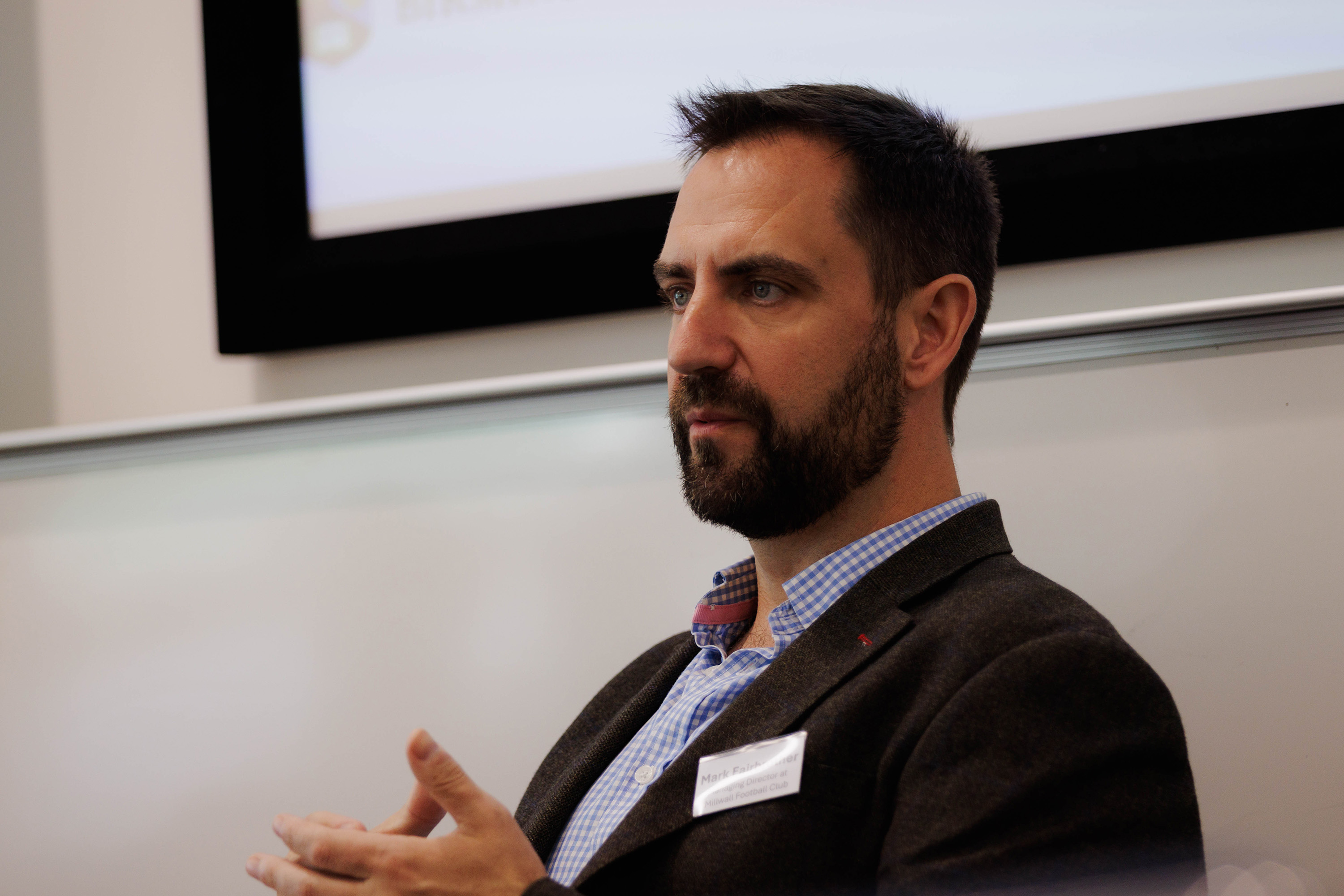 Male speaker at a conference