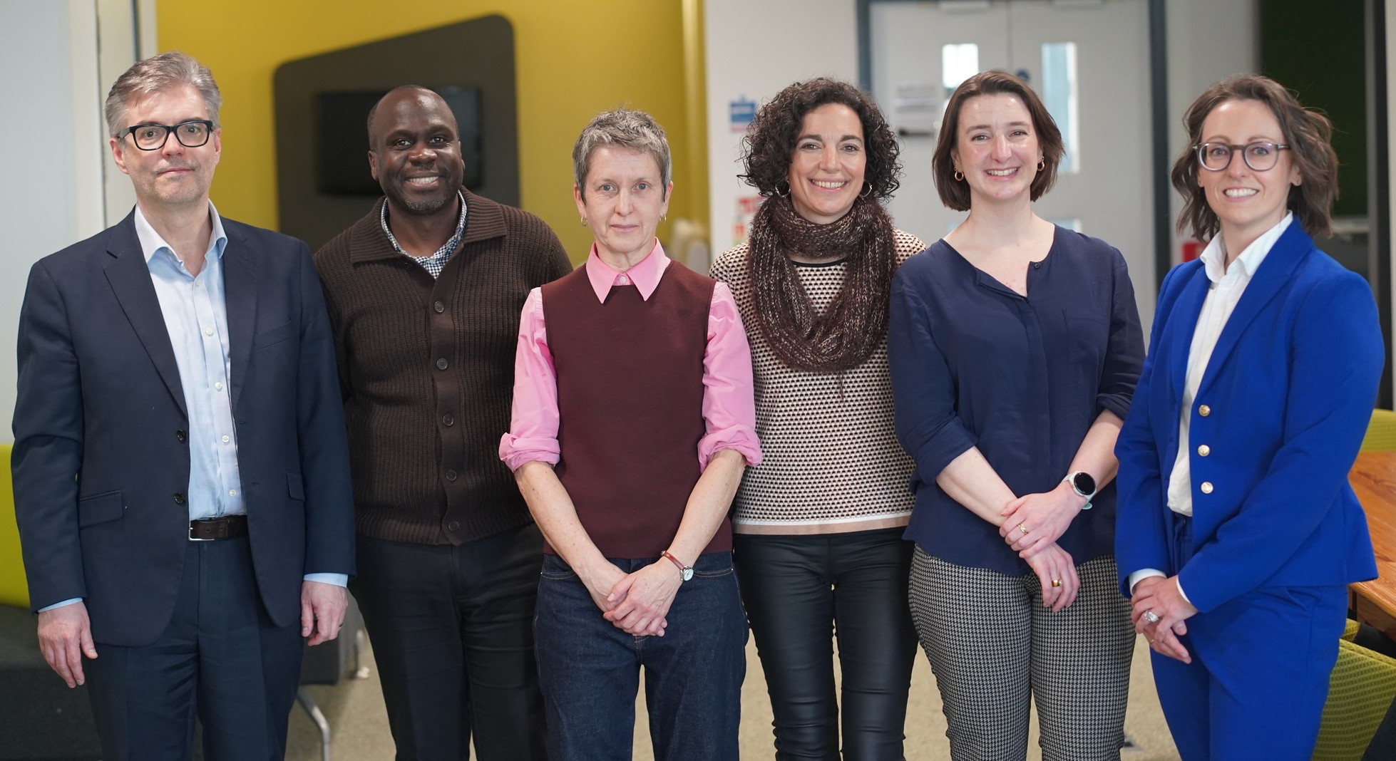 A group of researchers pose for a group photo