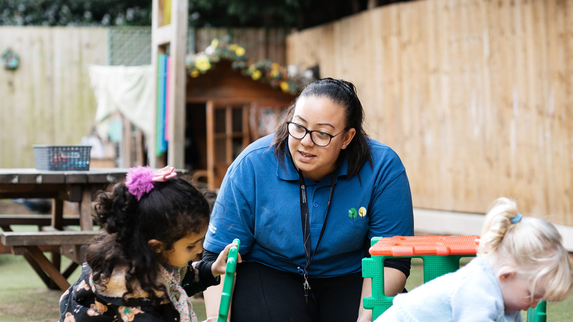 A staff member with a child