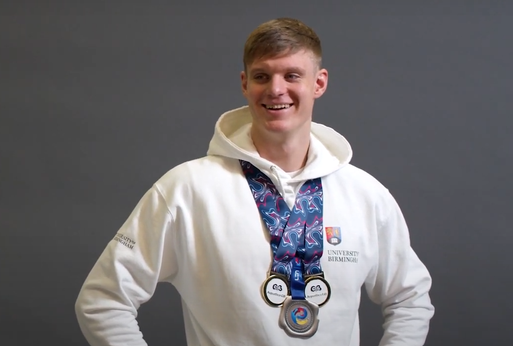 Ollie Morgan wearing medals