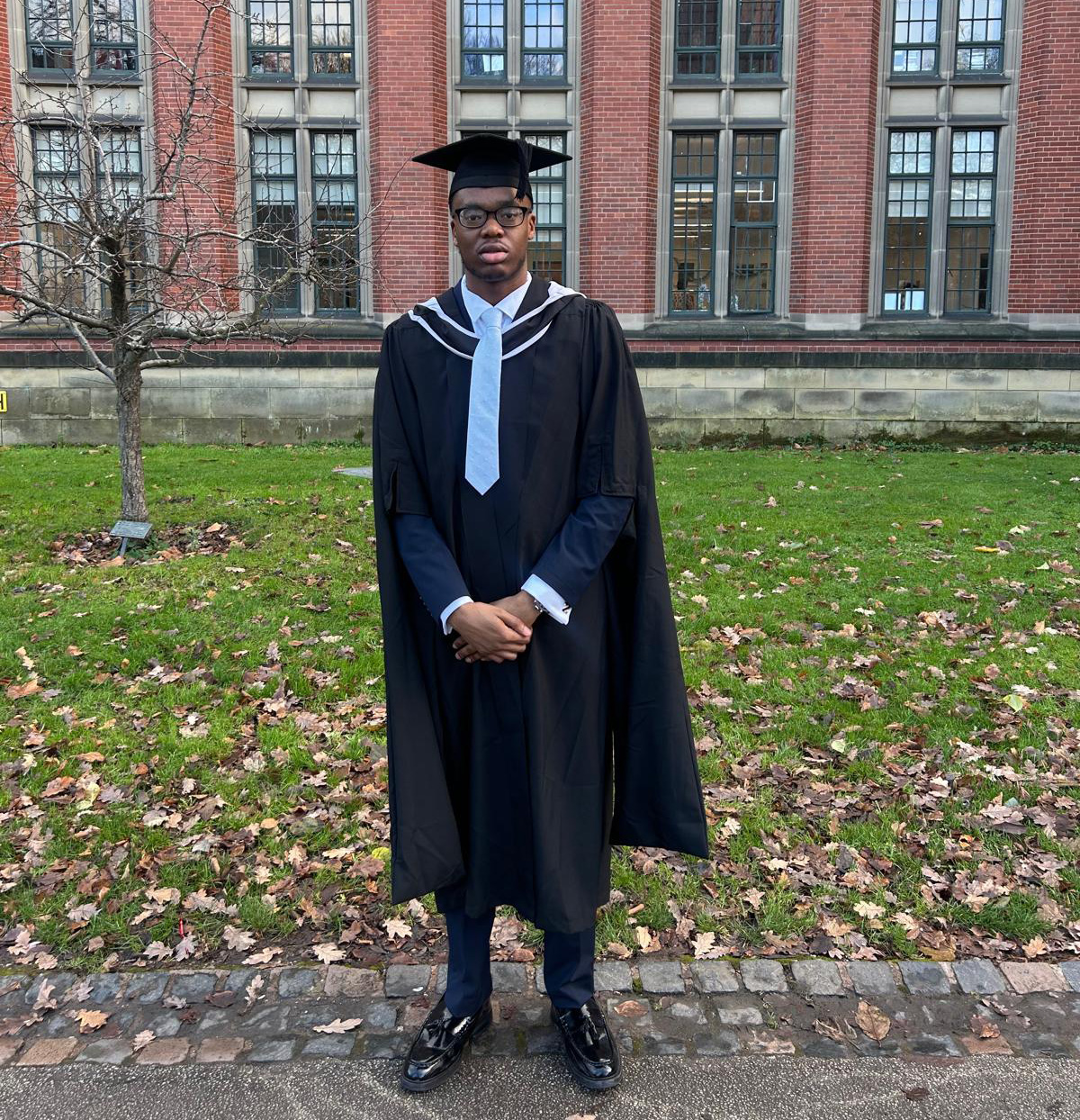 Osaro Ayo in his graduation gown