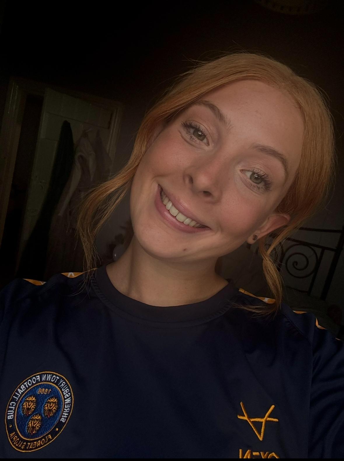 Portait style photo of woman smiling