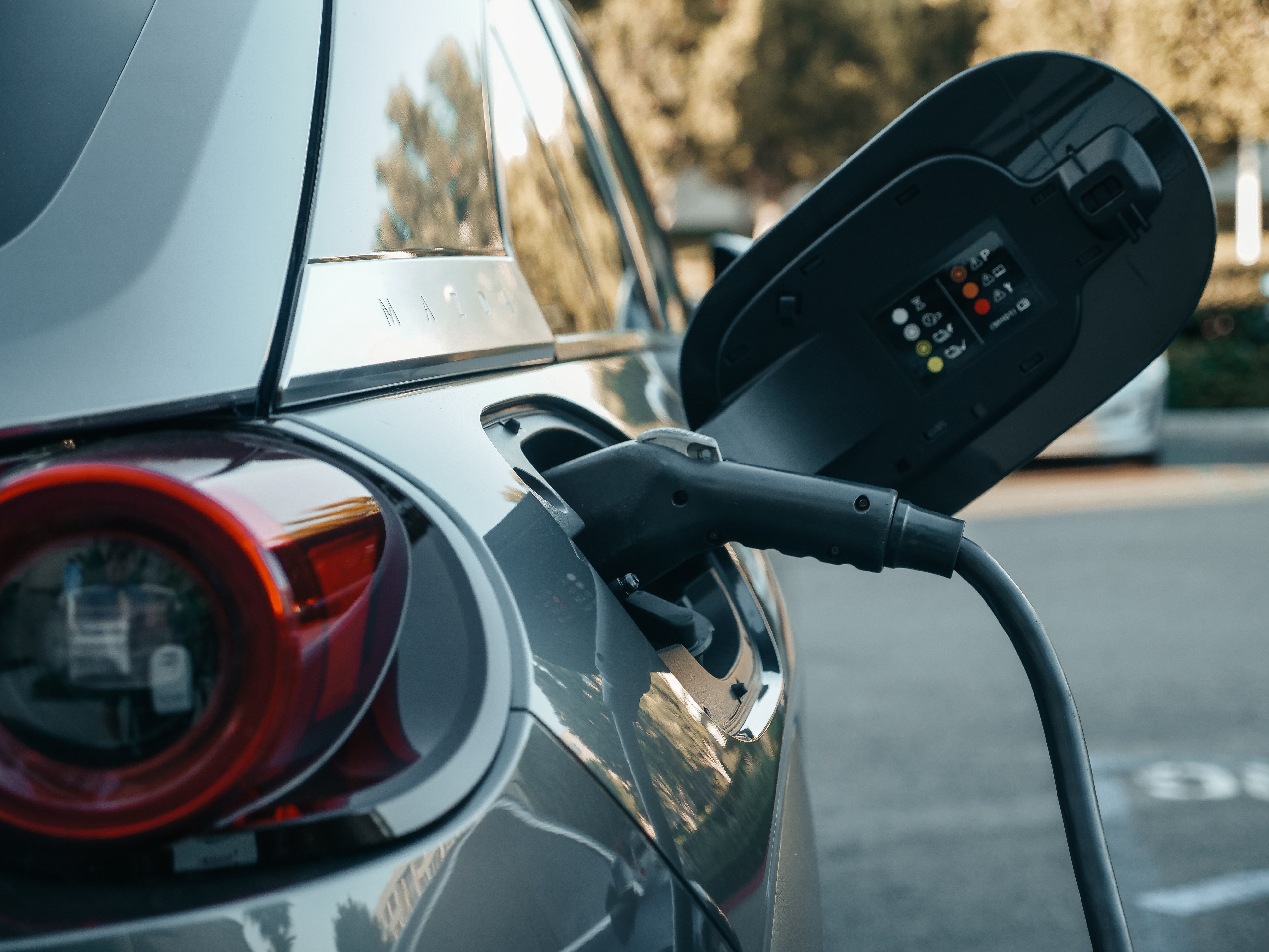 An electric car being charged 