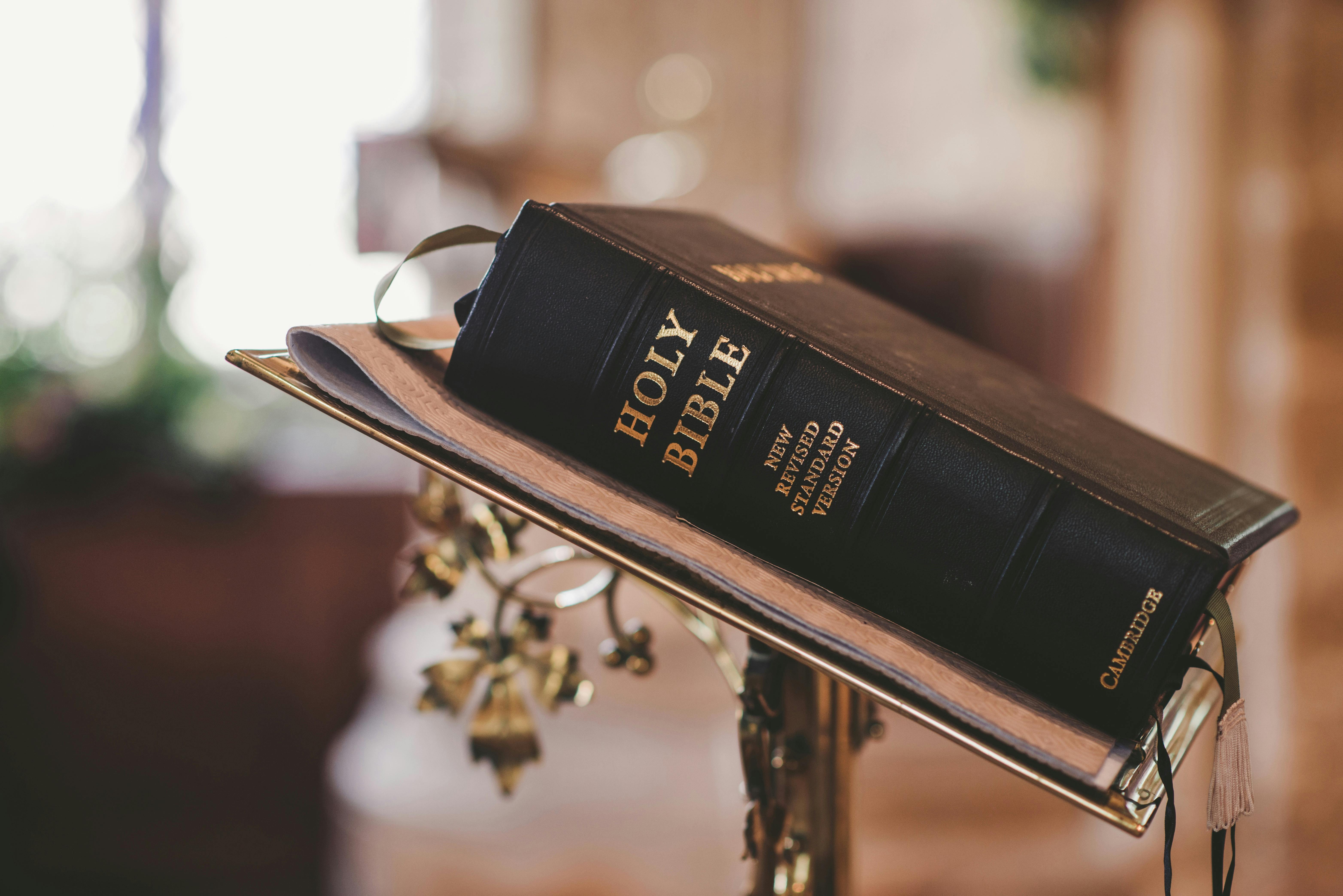 The Bible resting on a lectern. 