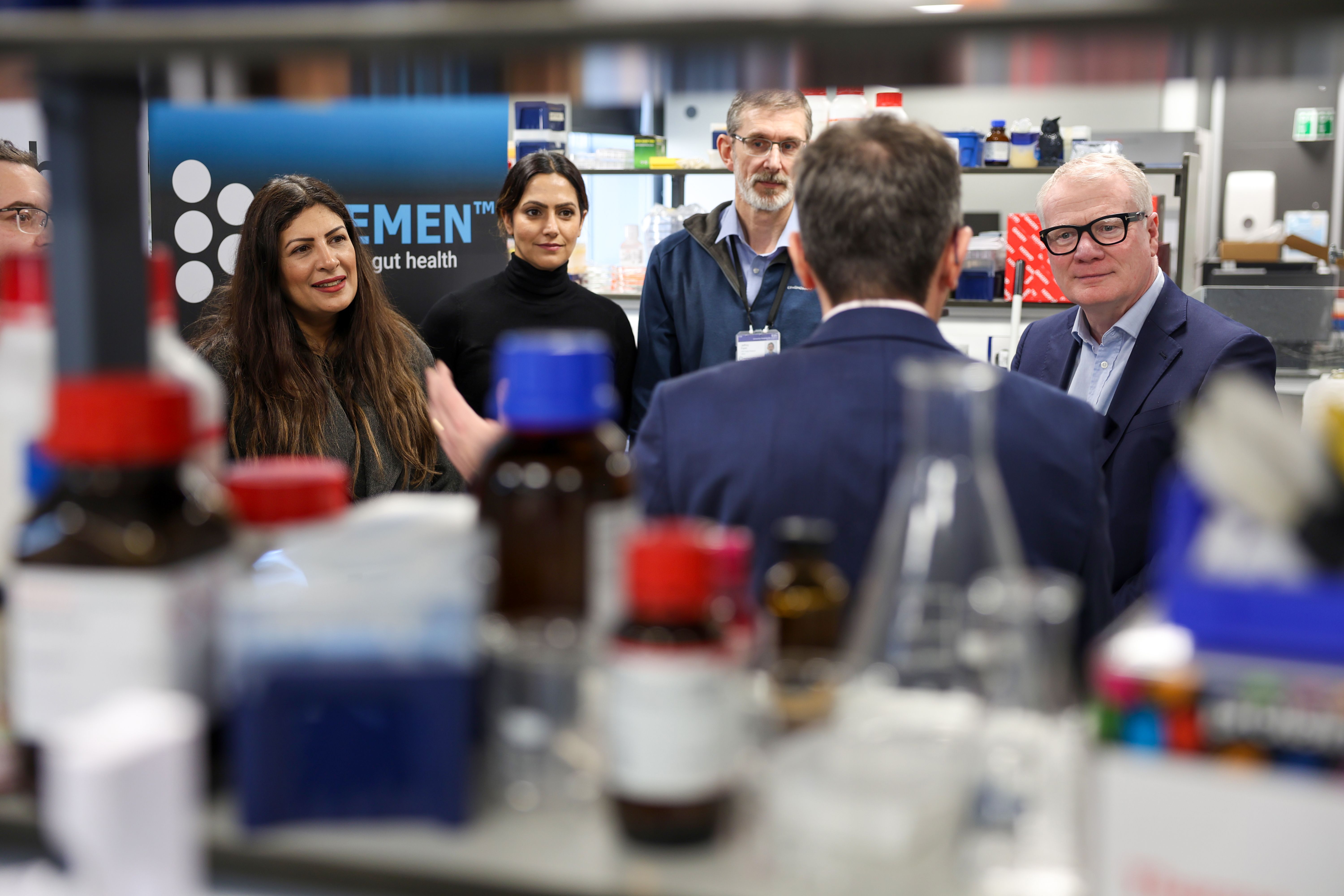 A group of people in a lab environment.