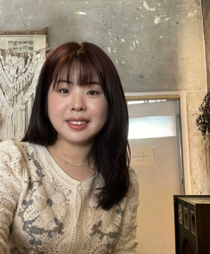Student Sungsil is smiling at the camera.
