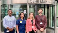 Adrenal tumour service team standing outside the QE hospital in Birmingham