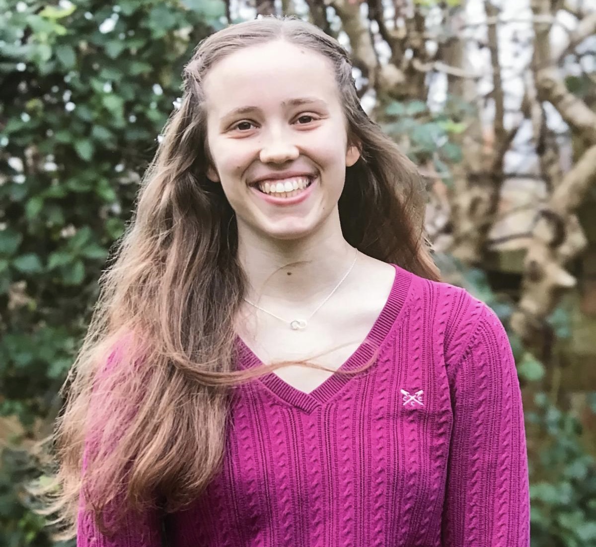 Portait style photo of woman smiling