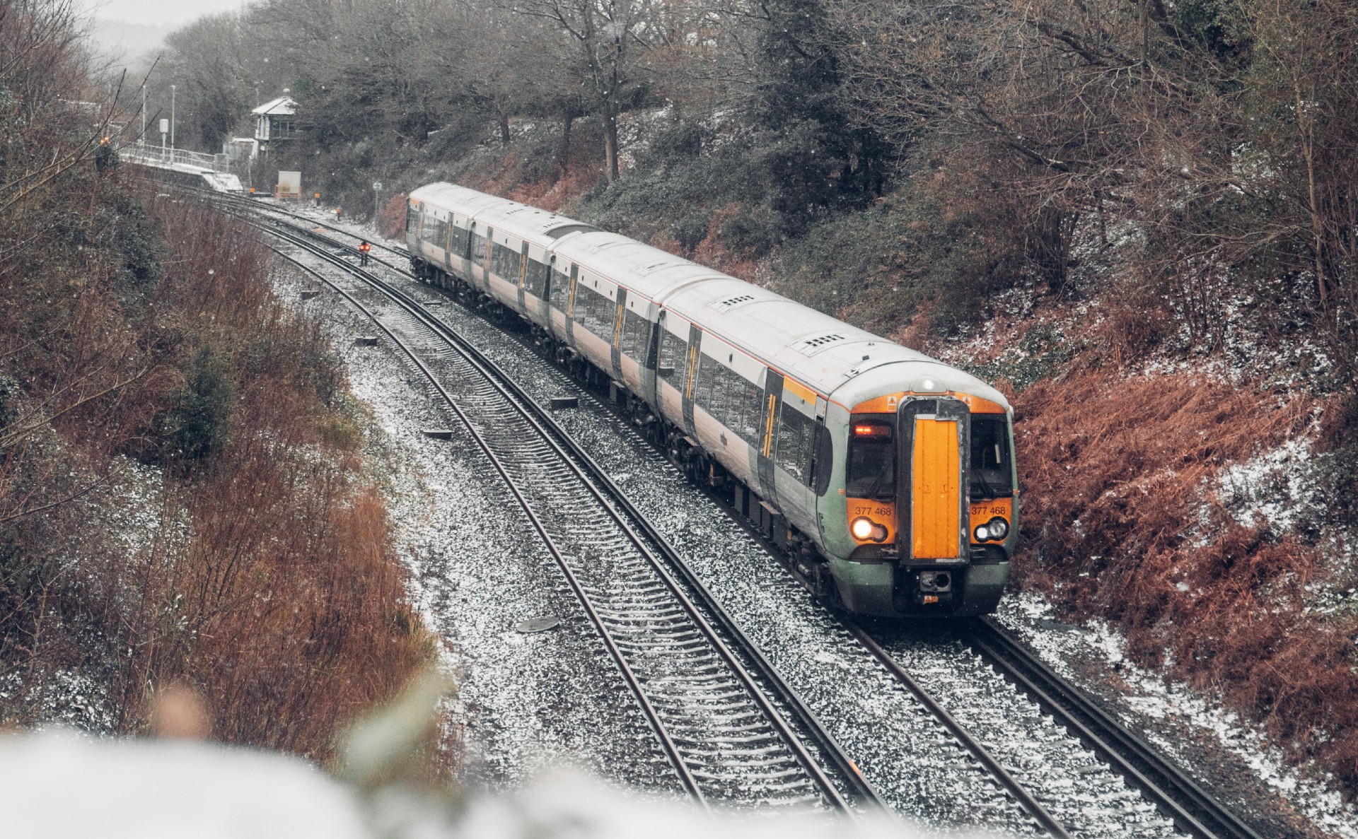  train standing on a snowy track