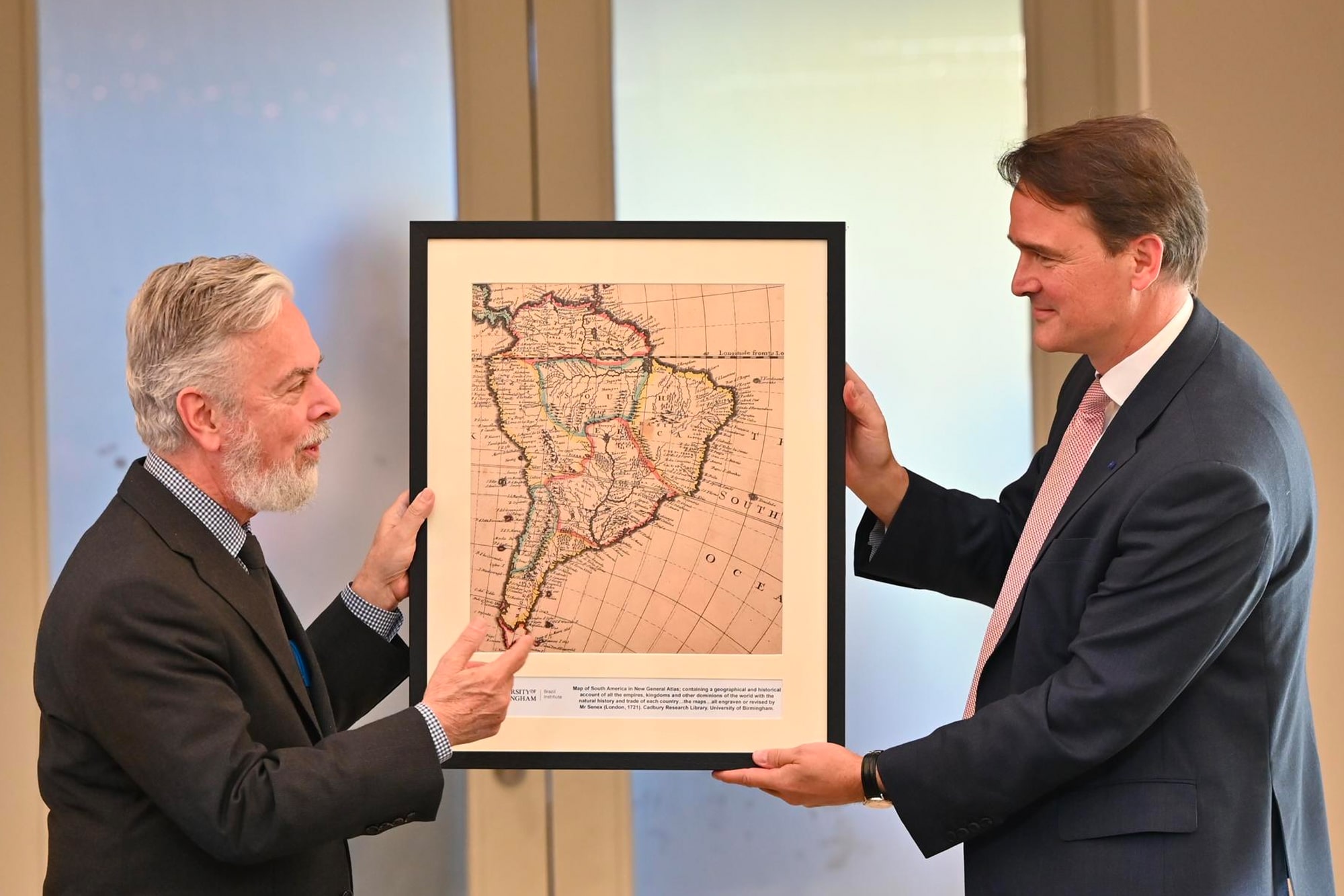 Professor Robin Mason presents His Excellency Mr Antonio Patriota with an 18th century map of South America