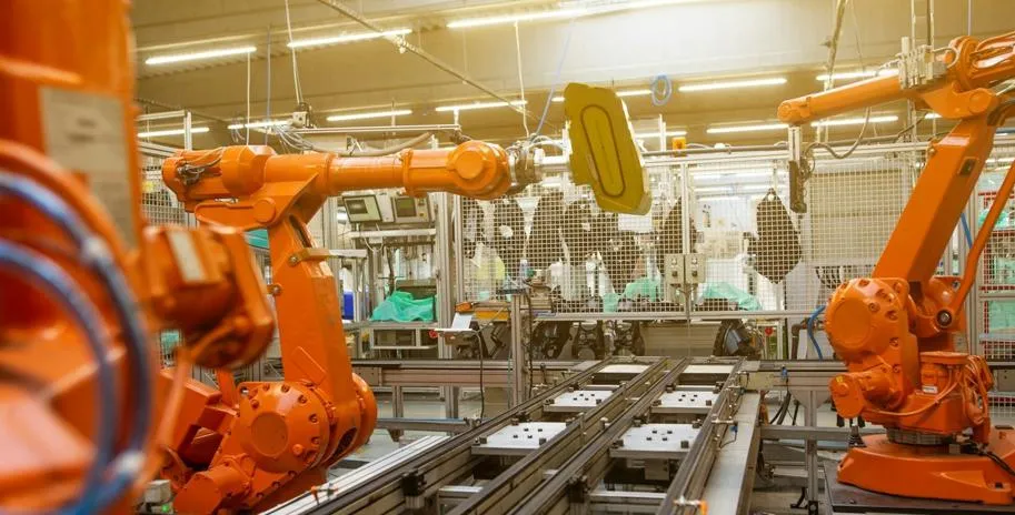 Robotic arms in a manufacturing setting