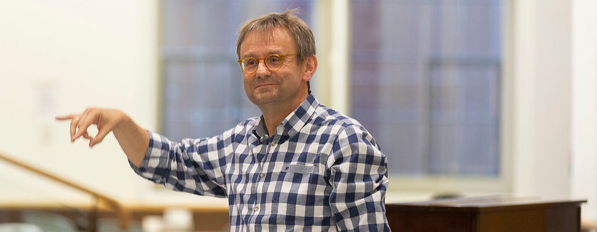 Professor Simon Halsey conducting in the Bramall Music Building