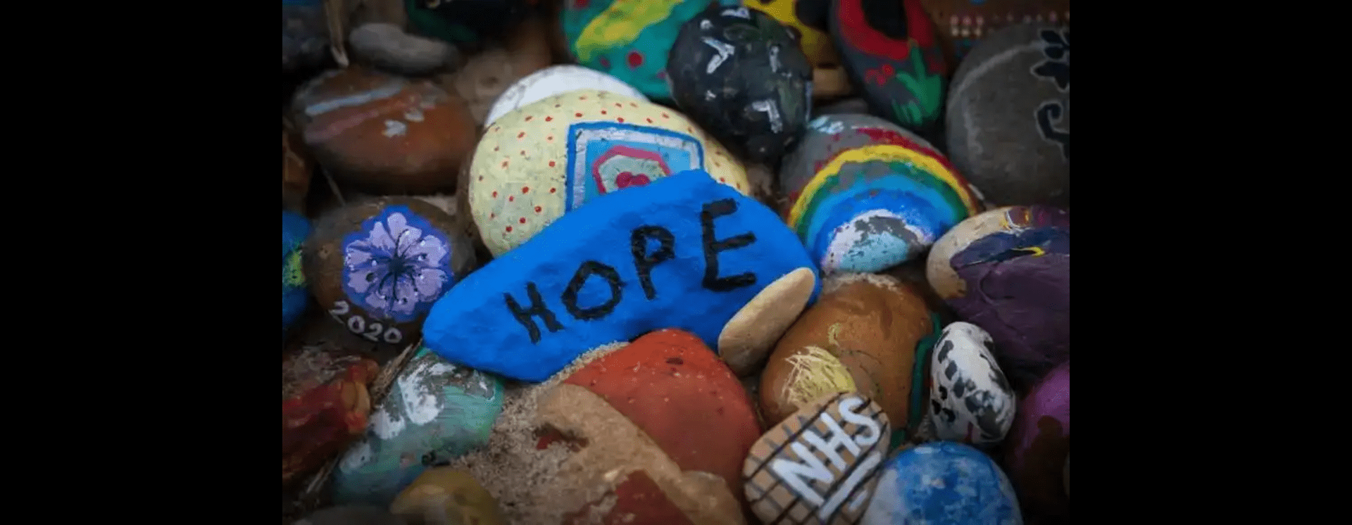 A pile of stone with the word 'hope' written on one of them