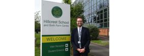 Physics teacher Mr Tom Squire standing outside Hillcrest School and Sixth Form Centre