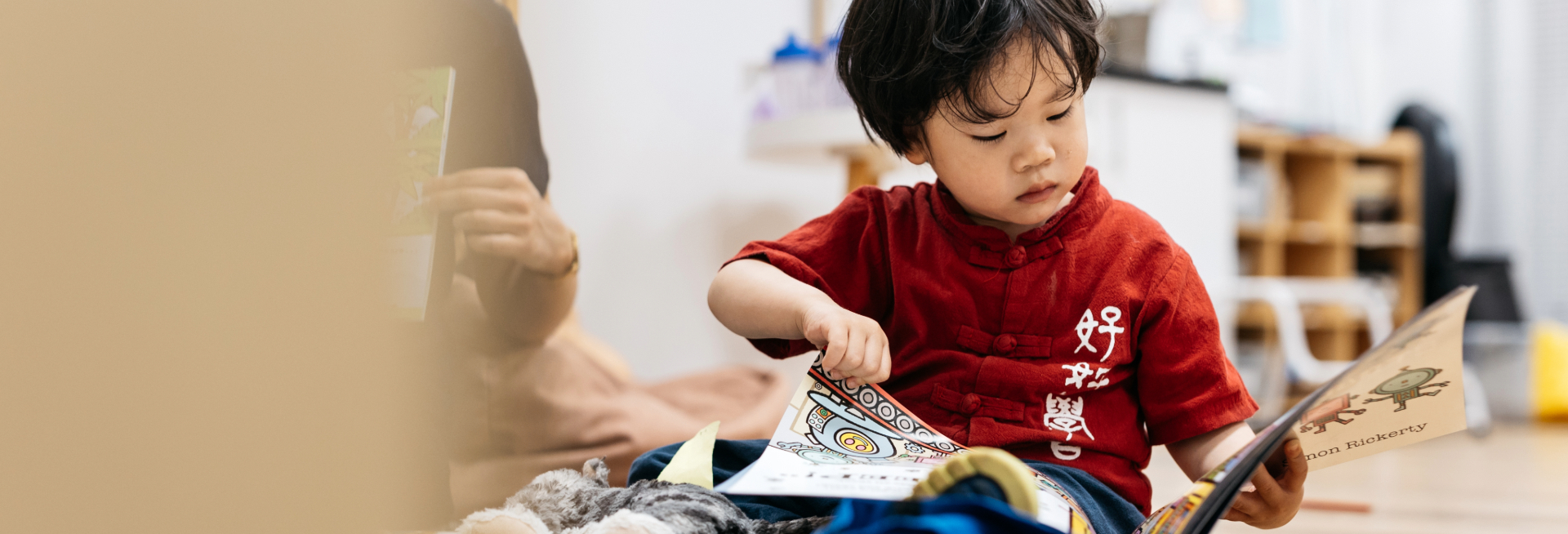 A young boy reading a book