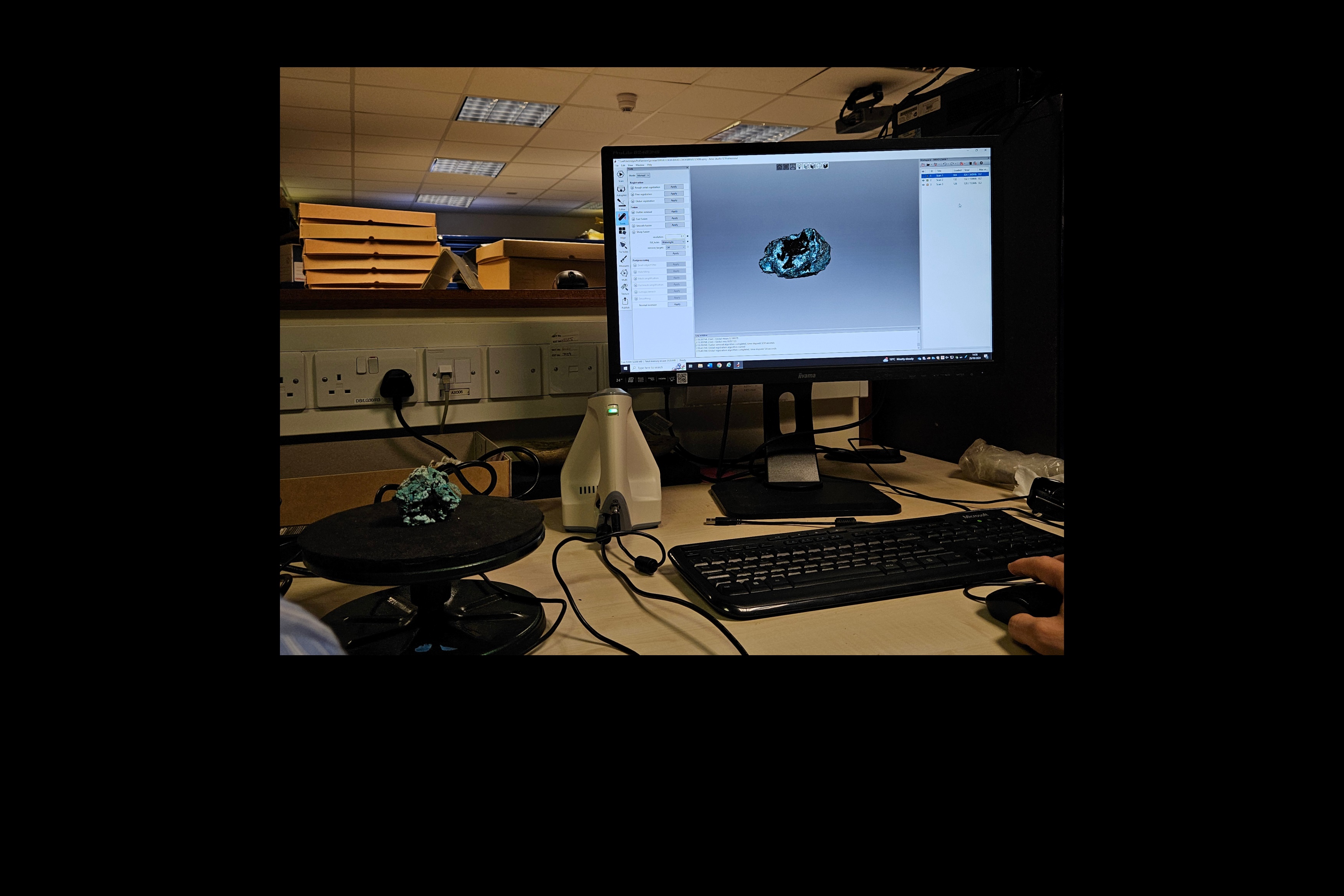 A 3D scanner and mineral.