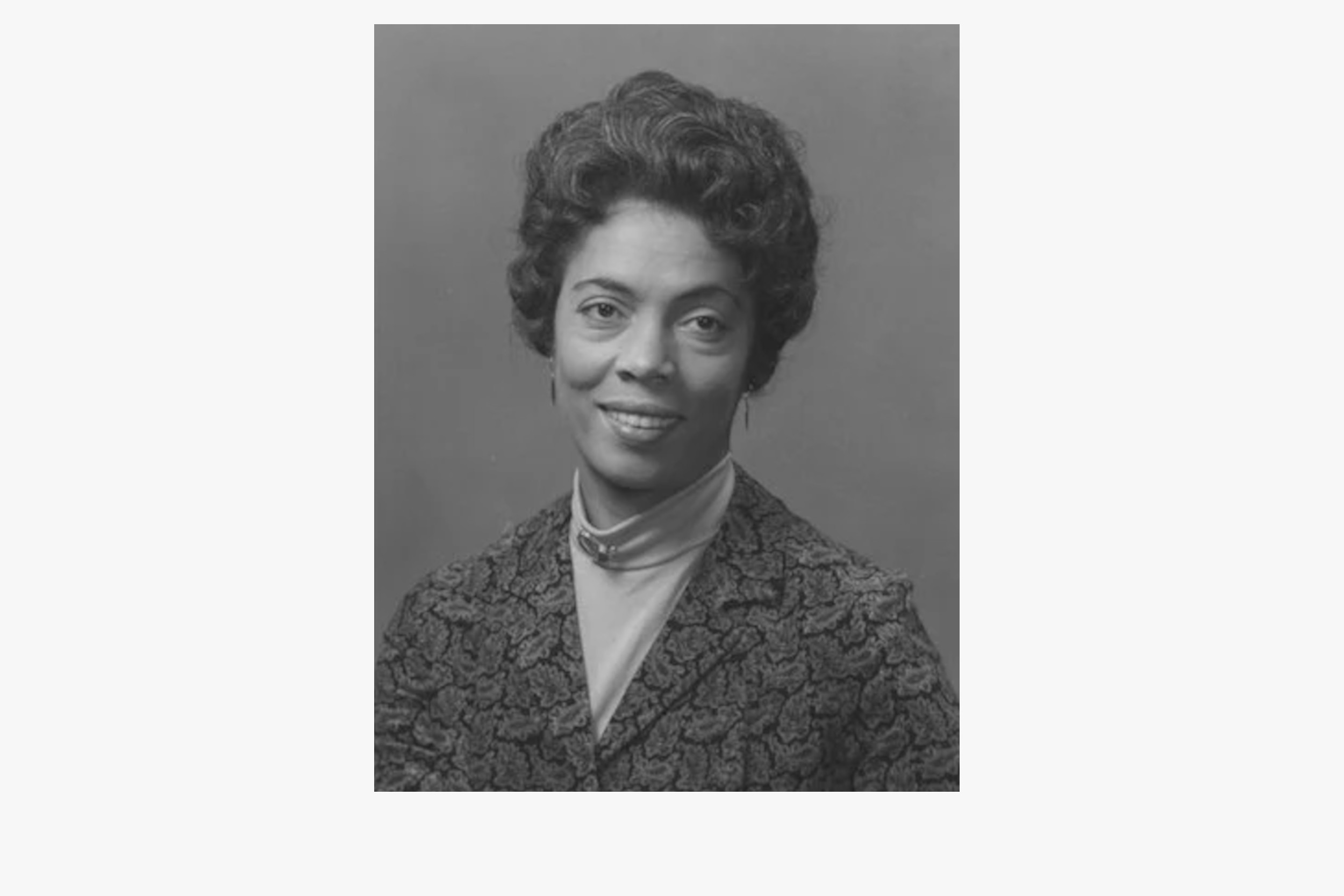 A black and white portrait of Marguerite Thomas Williams.