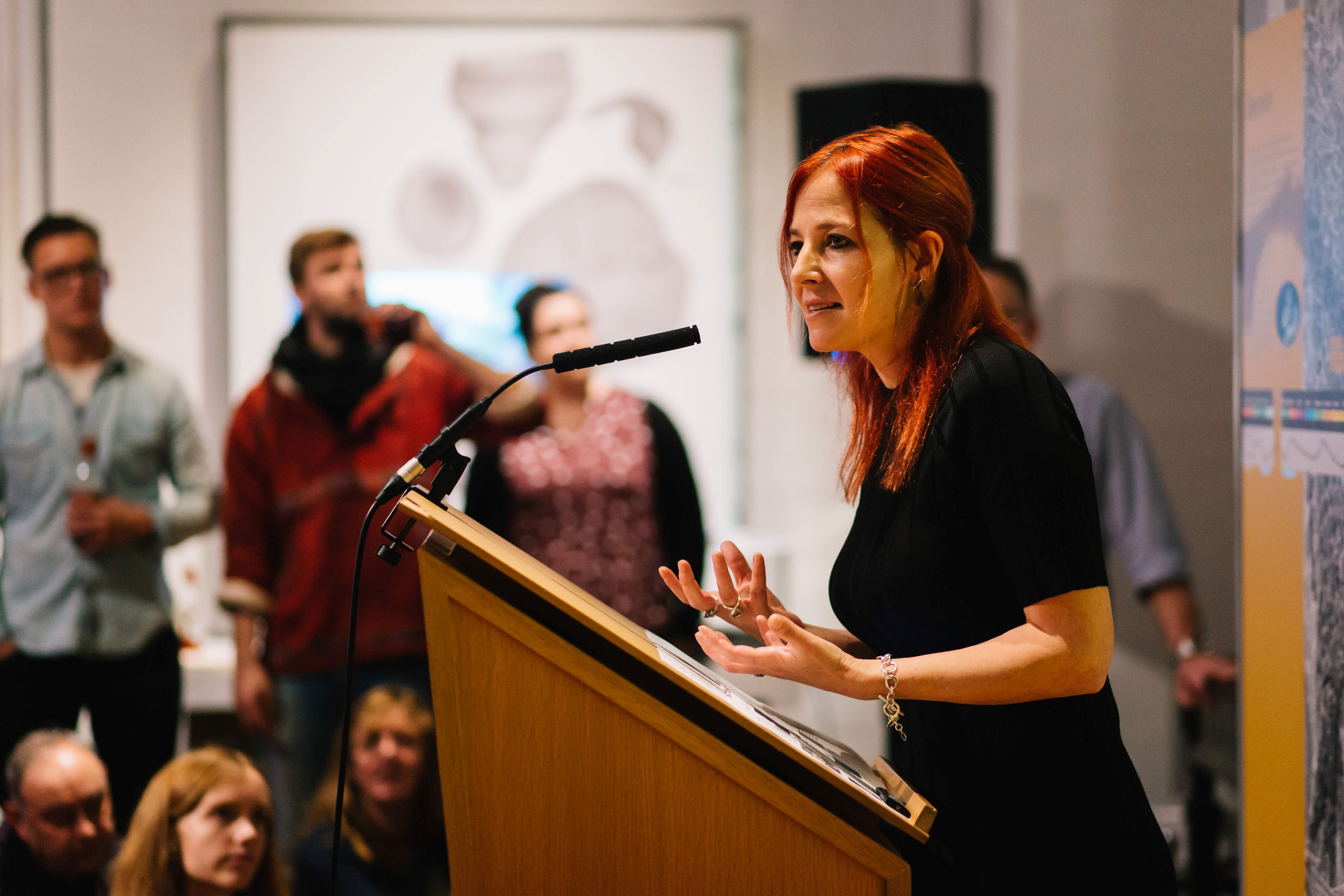 Alice Roberts presents a lecture.