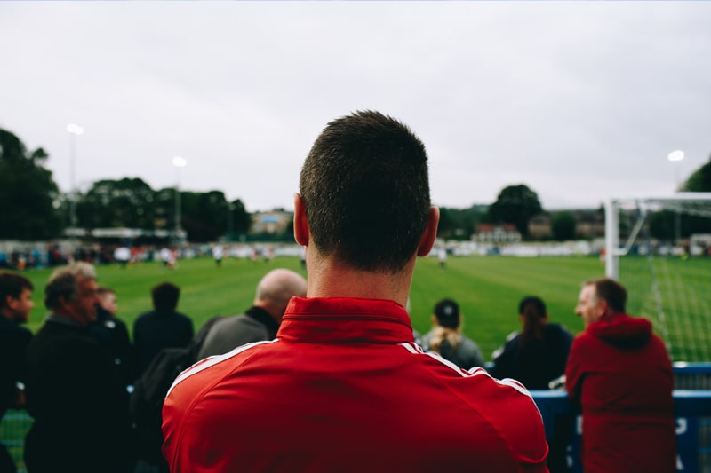 Male football supporter in the stands at a football match