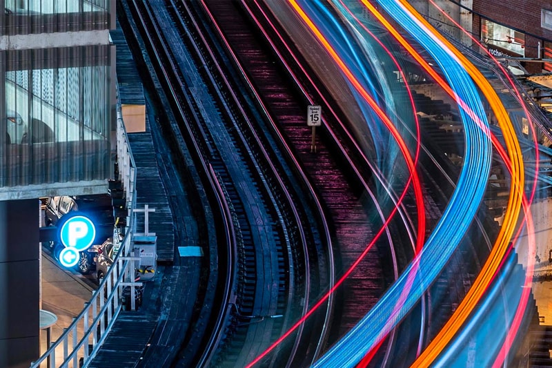 Long exposure of light trails from a passing train