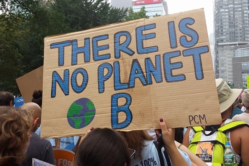 A protest placard with the words 'There is no Planet B'