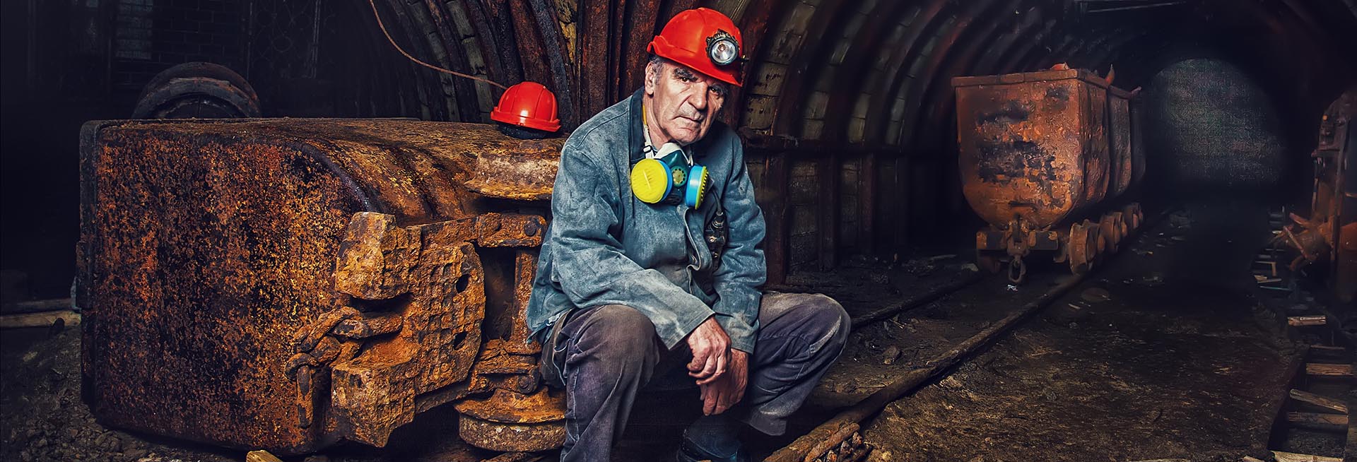 Old man at work looking unhappy