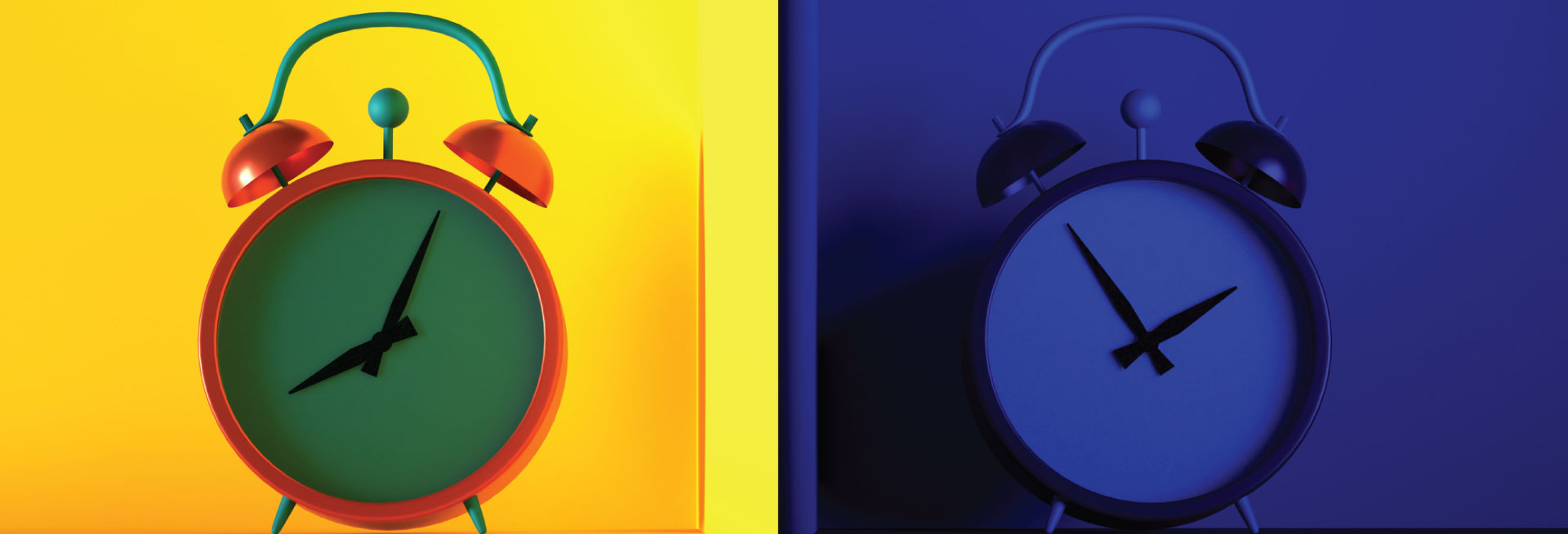 Two alarm clocks sit in a brightly lit room and a dark blue room.