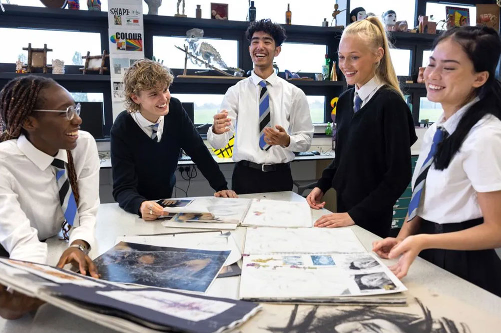 Pupils talking in a school