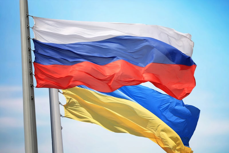 The flags of Russia and Ukraine flying side by side