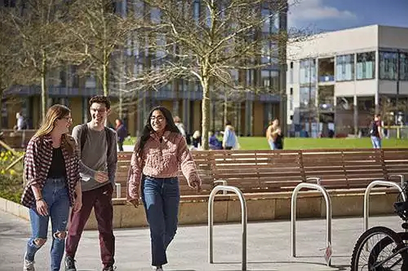 students-walking-laughing