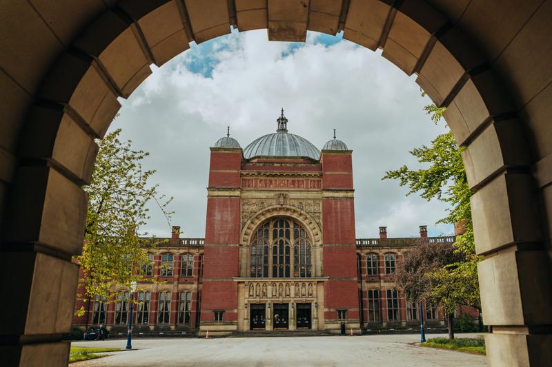 looking at the Aston Webb building from the Law School arches