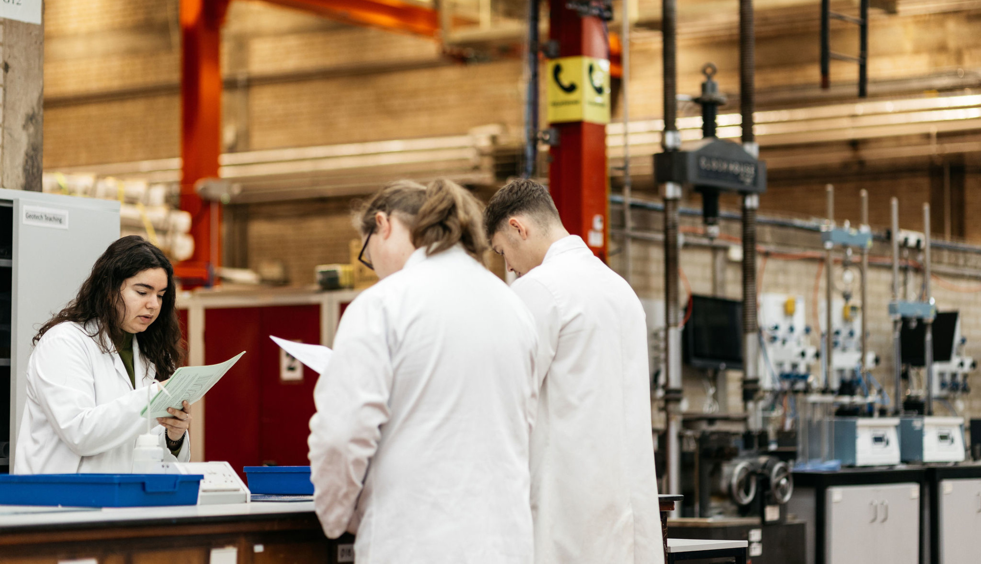 Three students working in our Civil Engineering lab