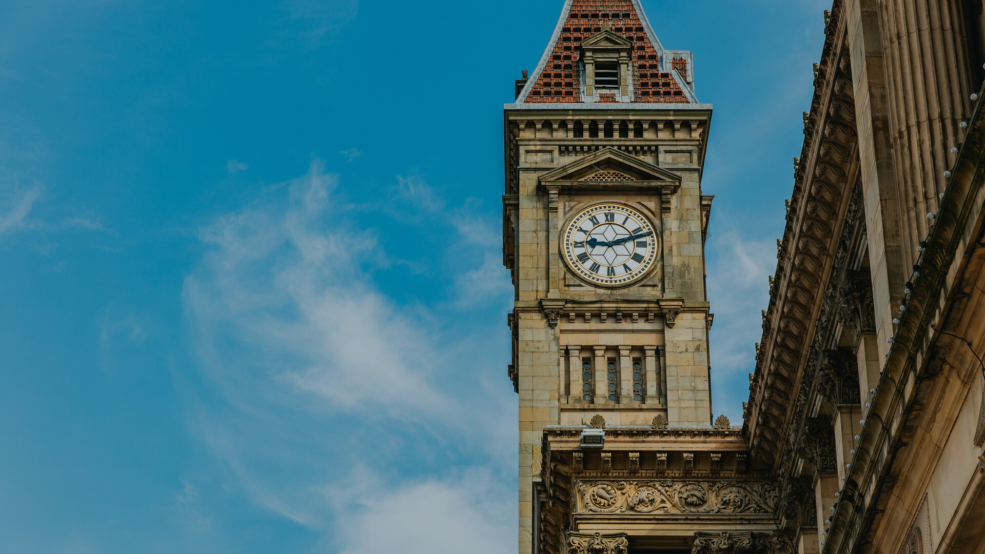 Clock tower against blue sky