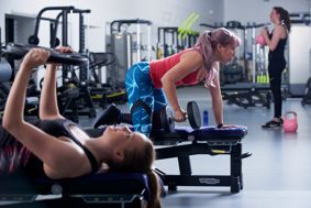 three women weightlifting